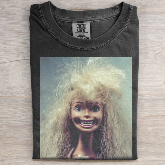 BARBIE GIRL WITH A WRY SMILE T-SHIRT